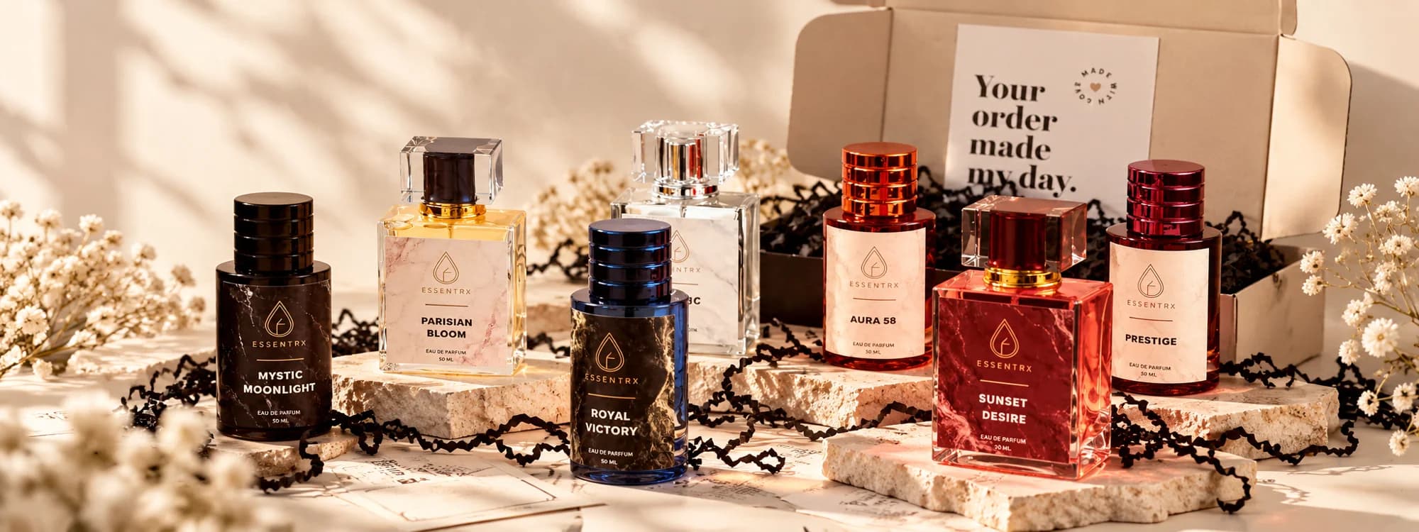 The Essentrx collection unboxed on stone, in soft daylight